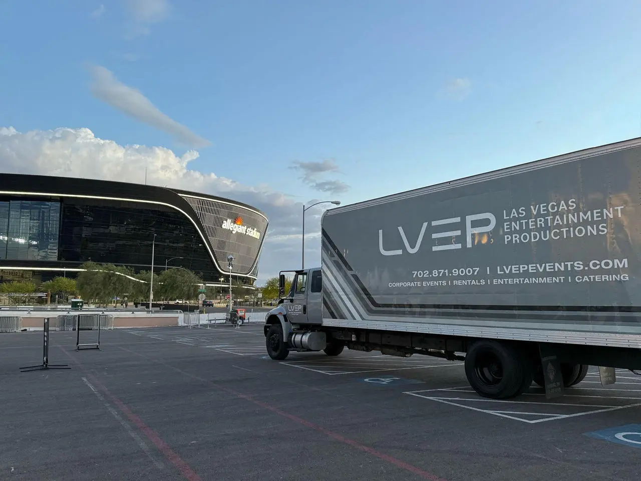 LVEP Las Vegas Entertainment Productions truck parked in front of Allegiant Stadium, showcasing event logistics and services in Las Vegas