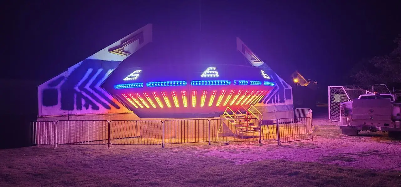 LED Illuminated Carnival Ride Night Event Blue Red Yellow Lights Event Production Las Vegas