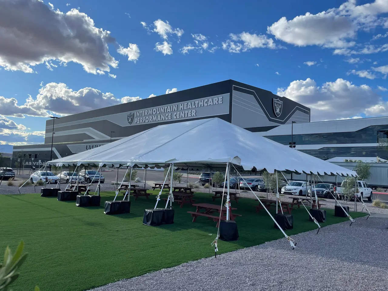 Outdoor Event Artificial Turf White Tent Picnic Tables Raiders Facility Event Production Las Vegas